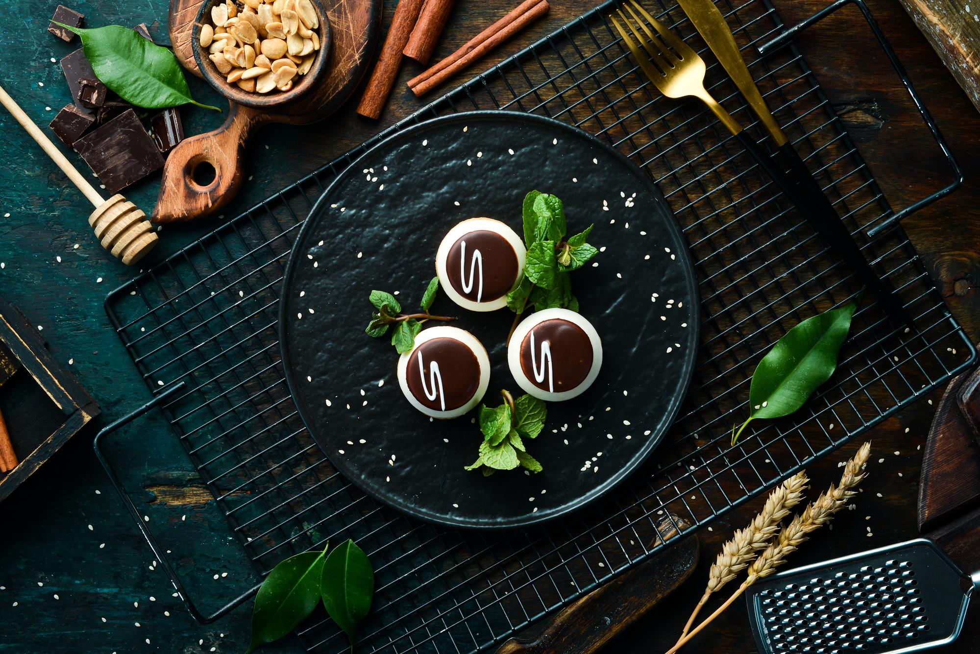 Elegant dessert on a dark plate